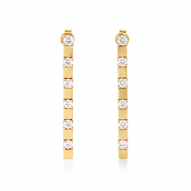 Baguette-Cut Drop Earrings with a straight geometric outline and white cubic zirconia in a gold-plated finish.