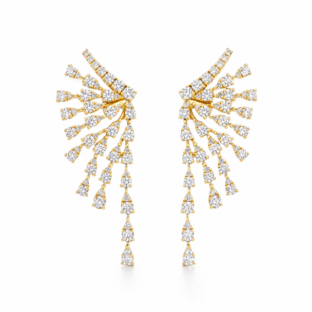 Cascade Crystal Drop Earrings with a branching arrangement of pear-cut white cubic zirconia in gold-plated settings.