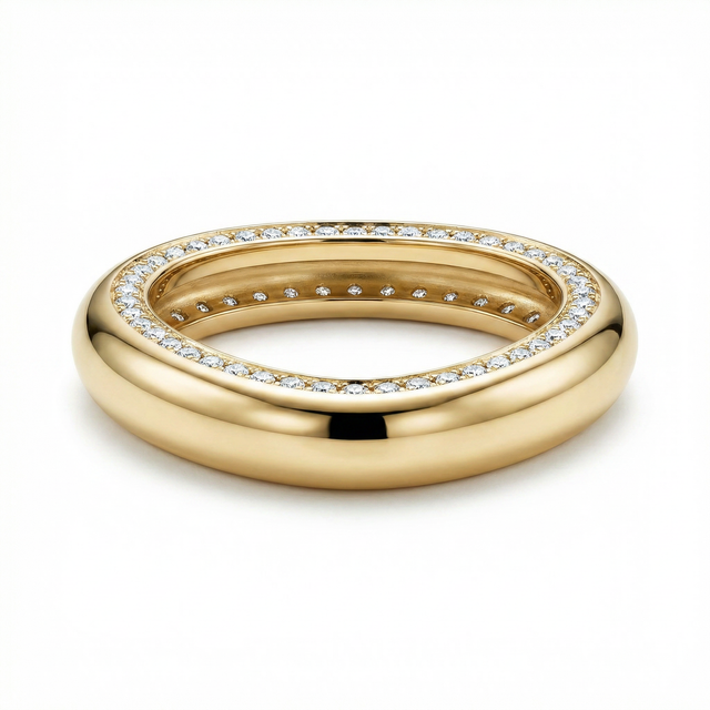Sculpted Halo Dome Ring with polished gold-plated curves and a border of white cubic zirconia.