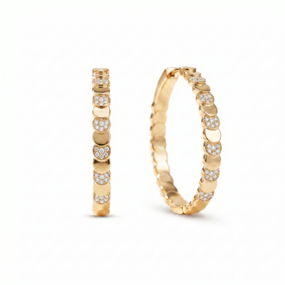 Luna Pavé Hoop Earrings with alternating polished gold-plated discs and white cubic zirconia sections.
